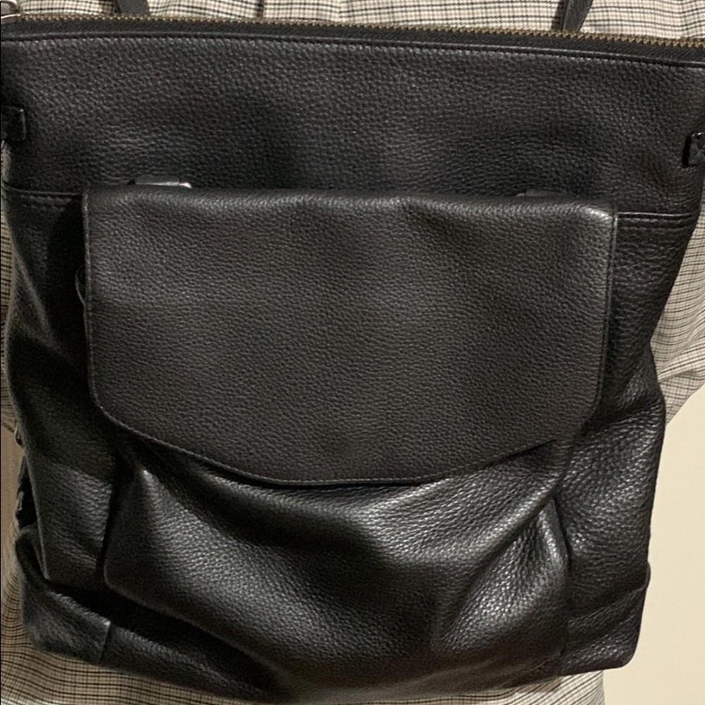 Tumi convertible black leather tote bag (shoulder/backpack/crossbody)